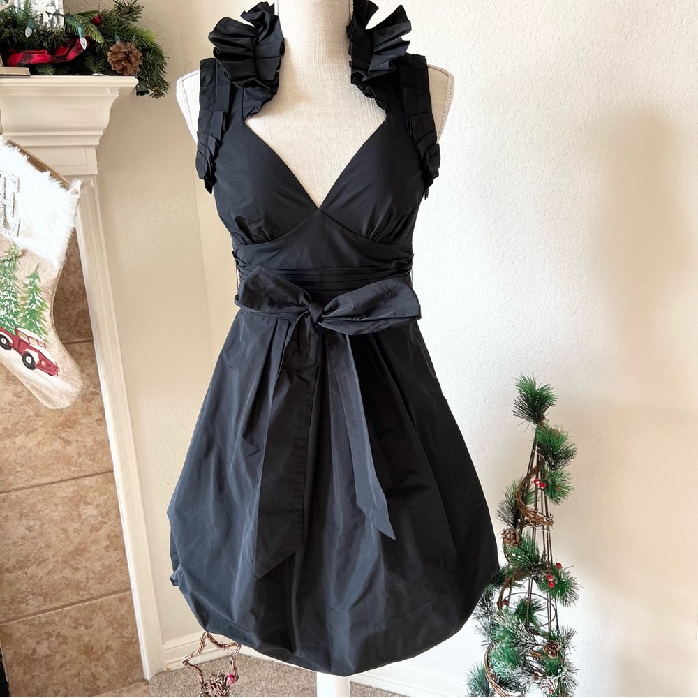 BCBG Paris size 2 deep v neck black detailed dress